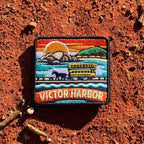 Victor Harbor embroidered travel patch with a horse-drawn tram travelling across the causeway.